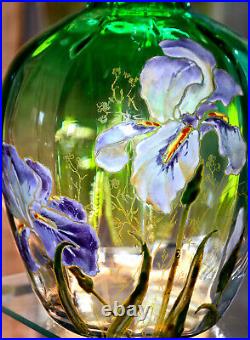 F. T. LEGRAS. Verseuse en verre teinté, à décor émaillé d'iris. Vers 1900