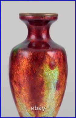 Fauré et Marty pour Limoges. Petit vase à décor d'émail polychrome Fauré et Marty pour Limoges. Petit vase à décor d'émail polychrome