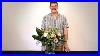How-To-Make-A-Tied-Flower-Arrangement-In-Clear-Cylinder-Vase-01-siis