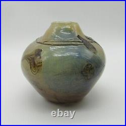 Patrick Lepage. Vase boule en verre soufflé à décor d'inclusions, XXe siècle