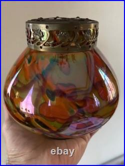 Vase en verre orangé avec pique fleurs en très bon état