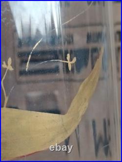 Vase en verre soufflé à décor doré