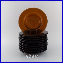 Verre d'art suédois. Douze assiettes profondes en verre d'art soufflé à la bo